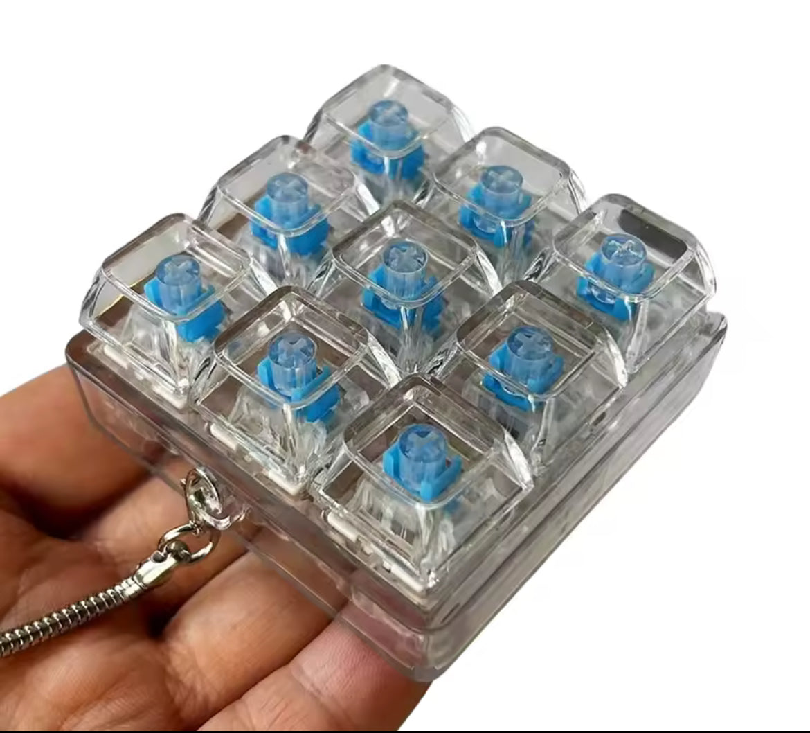 Mini Teclado para aliviar el estrés, llavero Fidget