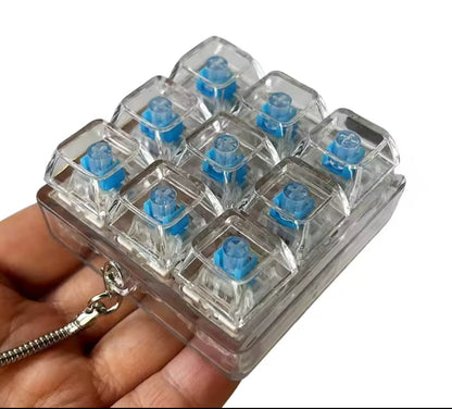 Mini Teclado para aliviar el estrés, llavero Fidget