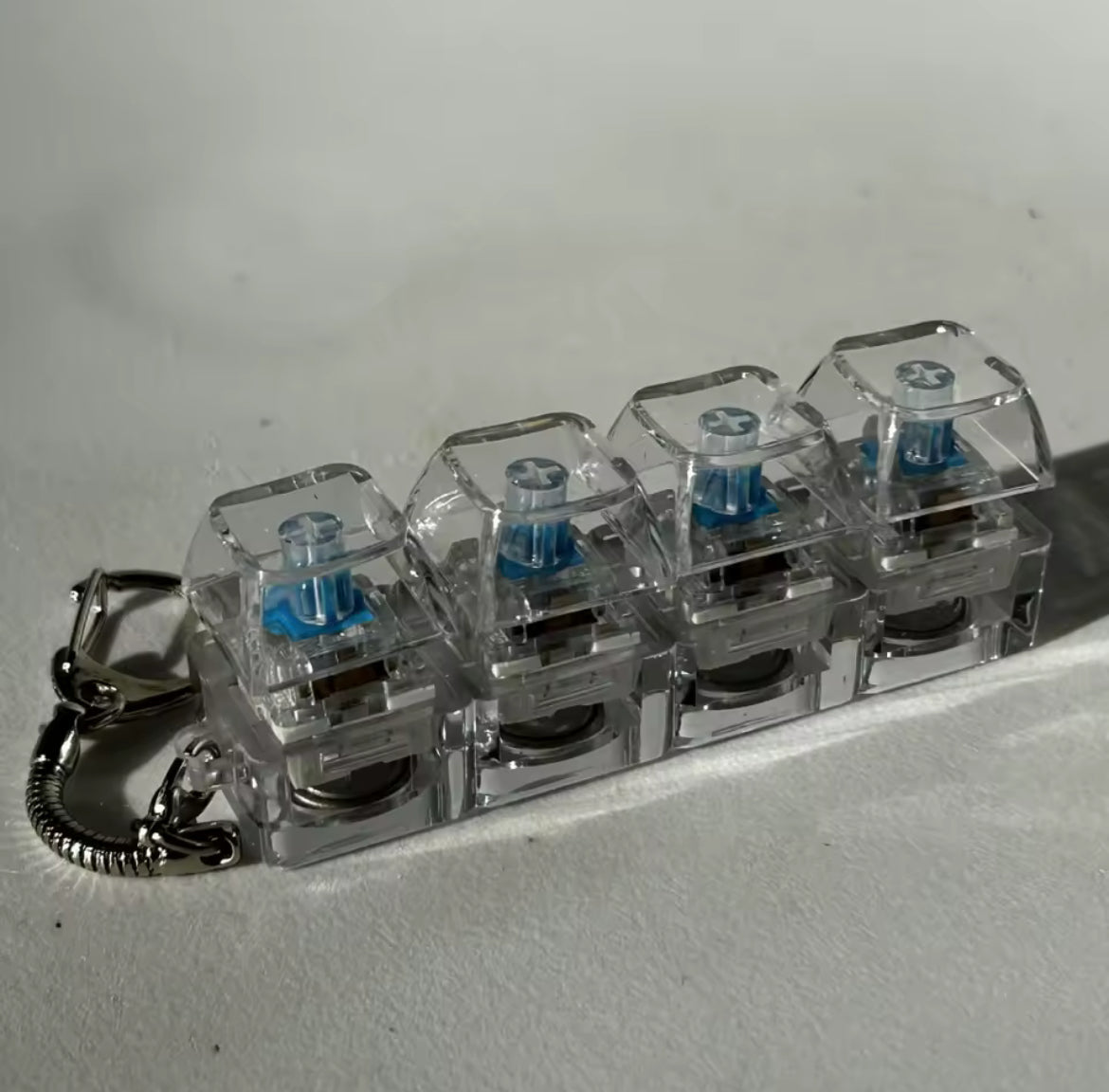 Mini Teclado para aliviar el estrés, llavero Fidget